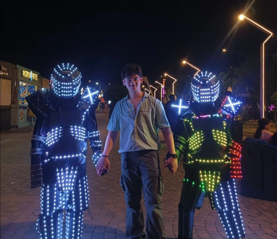 Family Interaction with Neon Man